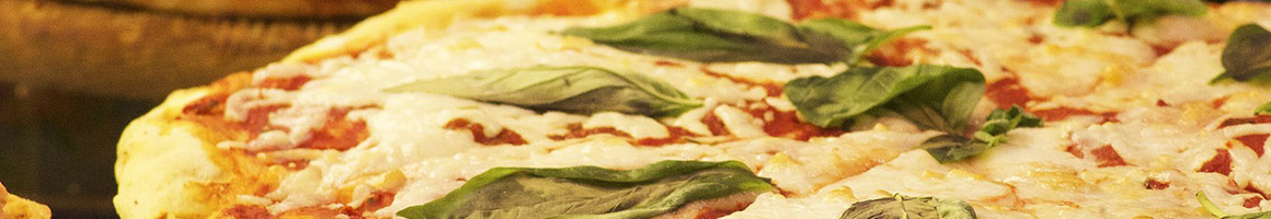 Eating Italian Pizza Sandwich at Pizza Boli's restaurant in Odenton, MD.